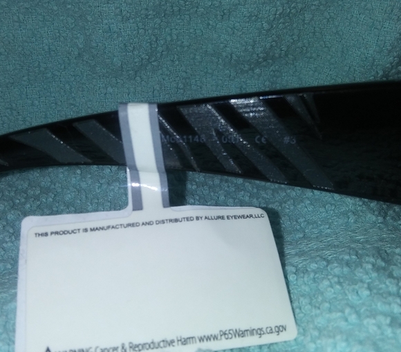 O By Oscar ed la Renta black stripped sunglasses - Picture 2 of 6